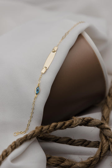 Χρυσή ταυτότητα Κ9 με μπλε ματάκι και άπειρο